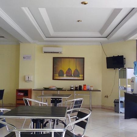 Quint Hotel Manado Esterno foto