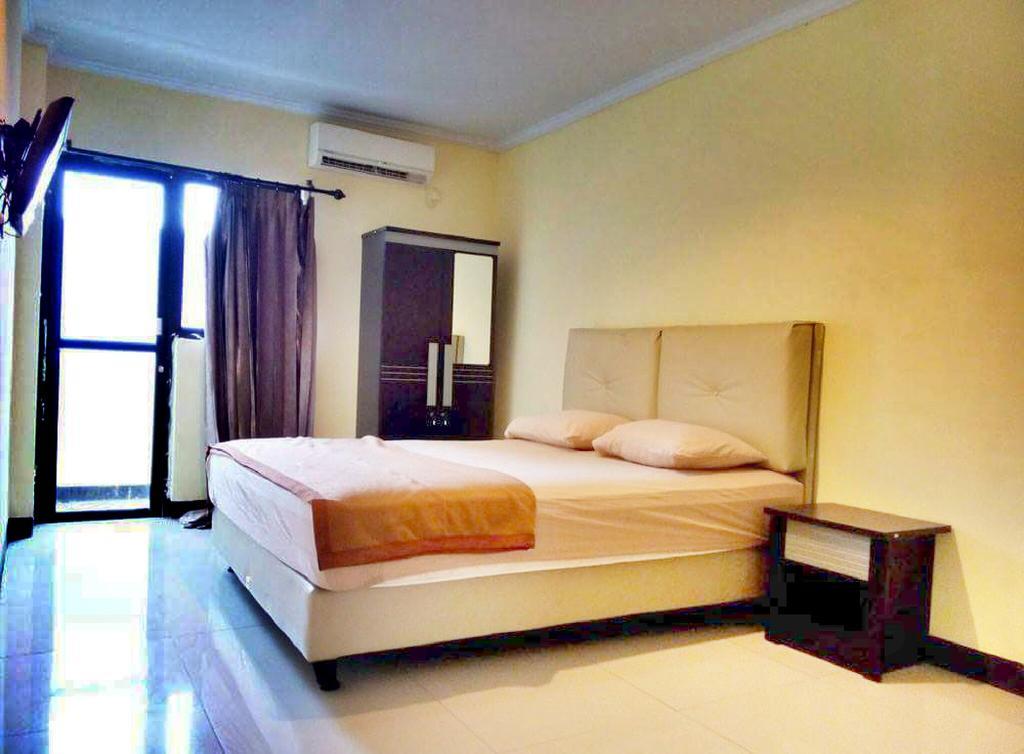 Quint Hotel Manado Esterno foto
